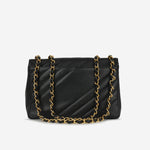 Chanel Vintage Jumbo Diagonal Flap - Black Caviar | Gold Hardware